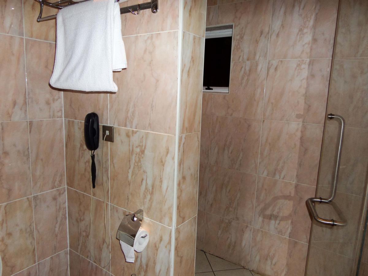 Aries Suites Lagos Camera foto